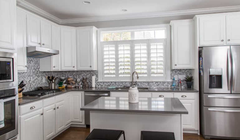 Polywood shutters in a Austin gourmet kitchen.